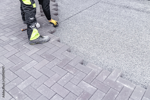 construction of a sidewalk made of concrete blocks, copy space