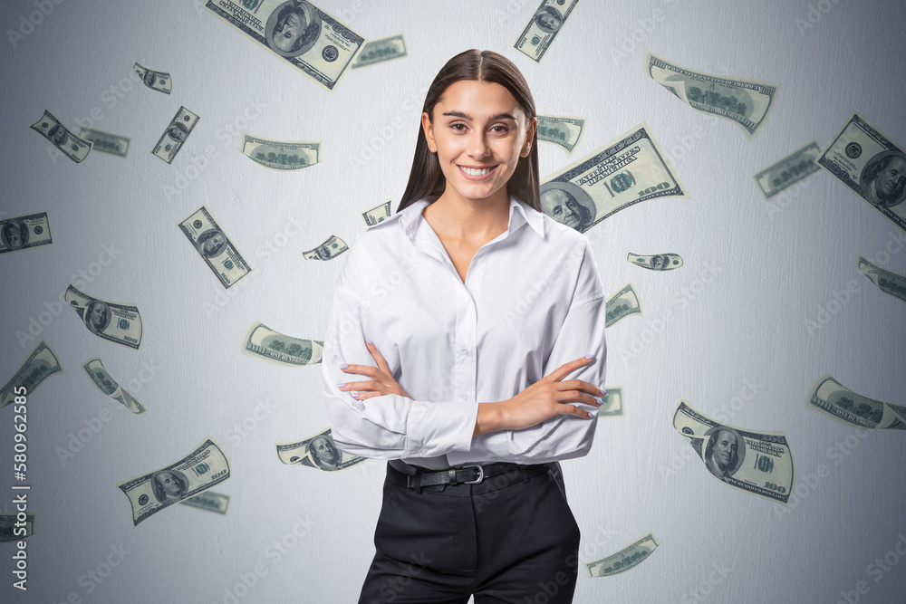 Business success, leadership, winner and result concept with happy smiling woman crossing hands on chest on light wall background with falling dollar banknotes Business success, leadership, winner and result concept with happy smiling woman crossing hands on chest on light wall background with falling dollar banknotes