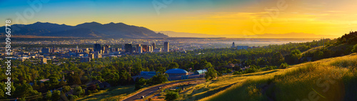 Salt Lake City skyline at sunset with Wasatch Mountains in the background, Utah