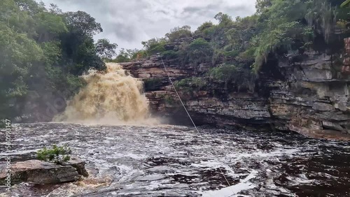 View of the river Mucugezinho with running water, forming a waterfall and Poco do Pato, in Chapada Diamantina, Bahia, Brazil photo