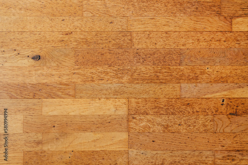 Worn parquet hardwood flooring as background