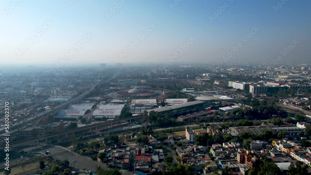 drone shot of main bus station in mexico city during a very polluted day drone shot of main bus station in mexico city during a very polluted day
