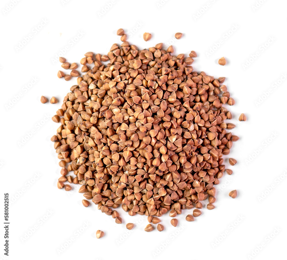 Close-up of dried raw Buckwheat isolated on white, top view Close-up of dried raw Buckwheat isolated on white, top view