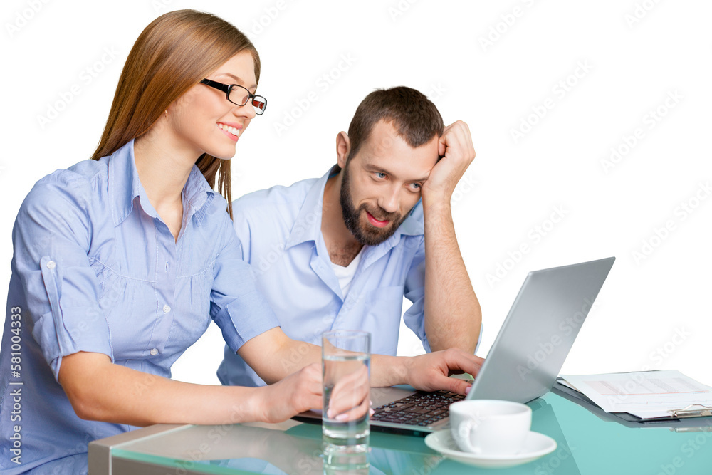 Business couple working on laptop sitting at desk Business couple working on laptop sitting at desk