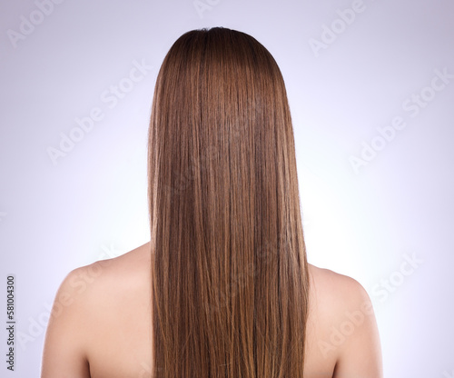 Beauty, back and haircare of woman in studio isolated on a gray background. Texture, cosmetics and female model with salon treatment for healthy keratin, balayage or hairstyle growth or straight hair