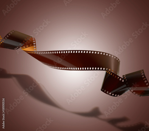 Floating twisted film for photo or video recording on brown gradient