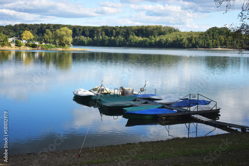 Several boats on the river landscape view 