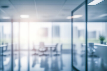 Beautiful blurred background of a light modern office interior with panoramic windows and beautiful lighting.
