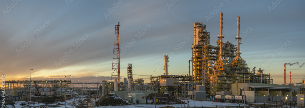 Modern chemical industry complex in the light of the setting sun-panorama