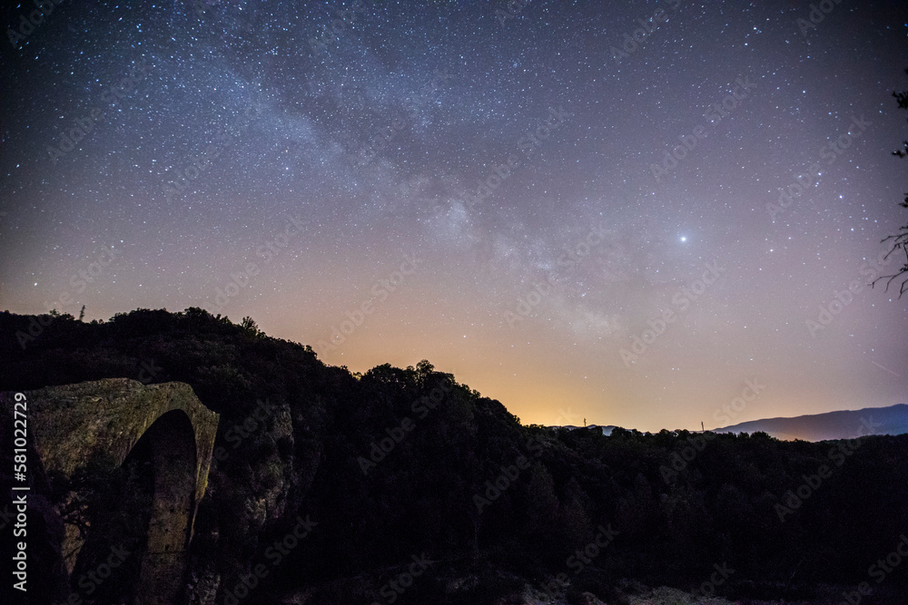 Milky way Llierca romanesque brige, La Garrotxa, Spain