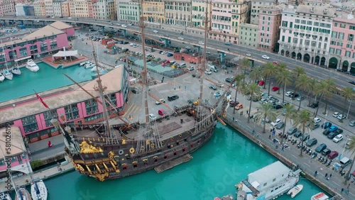 Neptune Spanish galleon replica ship anchored on Genoa waterfront; aerial arc photo