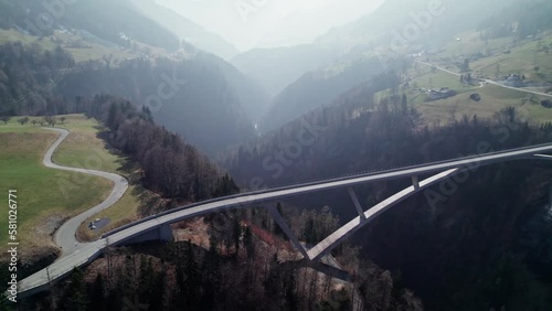 Aerial View Of Tamina Bridge Connecting Road Between The Towns of Pfäfers and Valens in the region St. Gallen. Parallax Shot photo