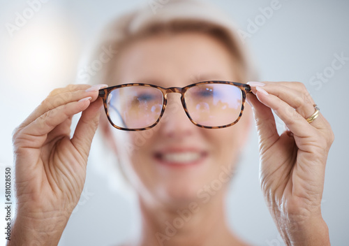 Optometry, vision and senior woman with glasses for eye care, health and wellness in clinic. Healthcare, ophthalmology and portrait of elderly female with spectacles prescription lens in optic store.