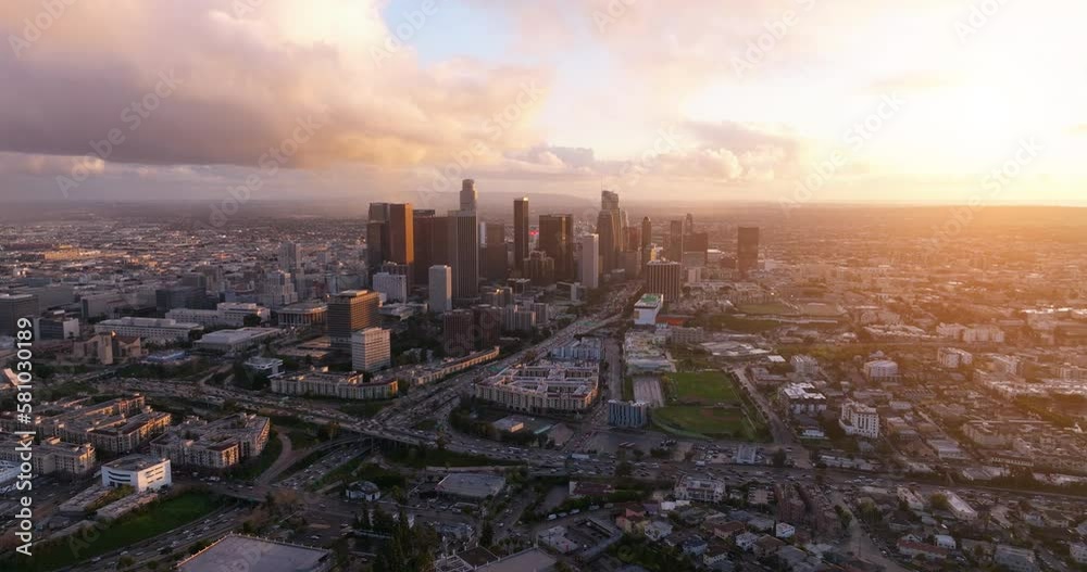 Los Angeles, California skyline and skyscrapers from above on a sunny day during golden hour before sunset. Los Angeles Downtown Sunset Skyline. Aerial of downtown Los Angeles in dawn. 