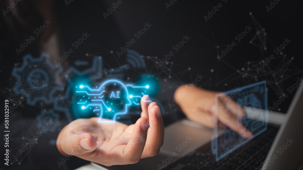 Businesswoman showing learning and use of artificial intelligence on virtual screen, ai with its use in education, data transfer between human intelligence and ai Businesswoman showing learning and use of artificial intelligence on virtual screen, ai with its use in education, data transfer between human intelligence and ai