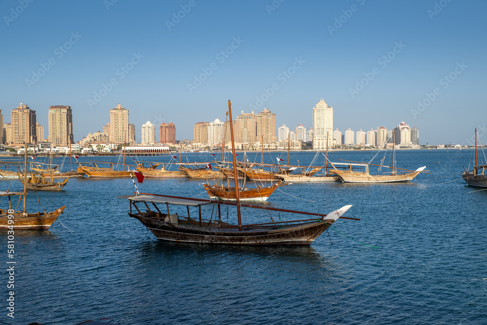 Doha, Qatar- Traditional wooden boats (dhows) in Katara beach 