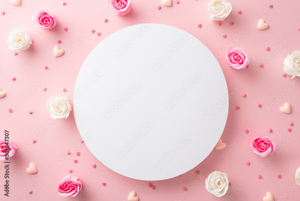 Mother's Day concept. Top view photo of white circle small rose buds and heart shaped sprinkles on isolated pastel pink background with blank space