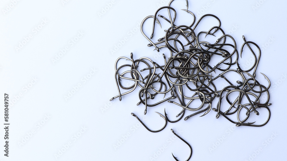 close up shot of fish hook on white background close up shot of fish hook on white background