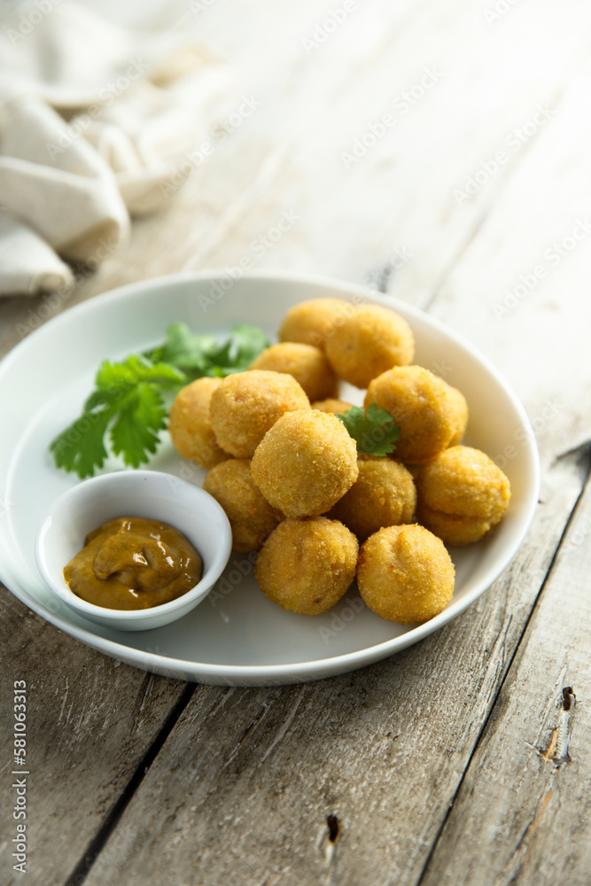 Homemade salmon croquettes with mustard Homemade salmon croquettes with mustard