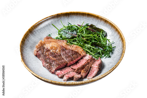 BBQ Roasted Chuck Roll Tender beef steak with salad in plate. Isolated, transparent background.