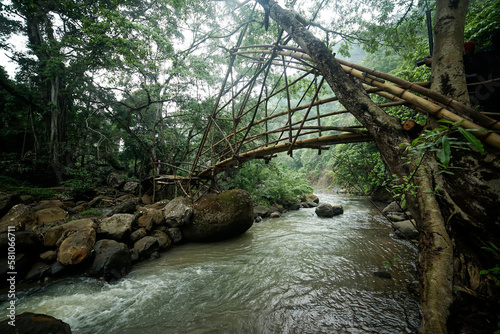 Traditional bridge made of bamboo in Sukabumi, West Java, Indonesia photo