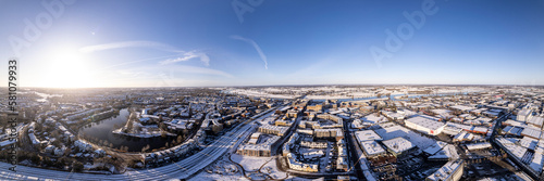 Panorama 180 degrees ready for VR winter wonderland Noorderhaven neighbourhood and tower town Zutphen, The Netherlands. Aerial cityscape after a snowstorm.