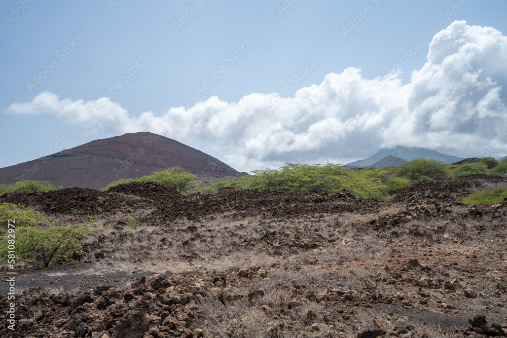 Cross hill. Island landscape with dry grass and volcanic sand. Ascension island.