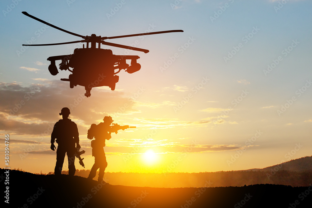 Silhouettes of helicopter and soldiers on background of sunset. Greeting card for Veterans Day, Memorial Day, Air Force Day. USA celebration.