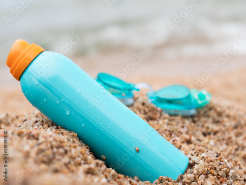 Sunscreen on the beach sand