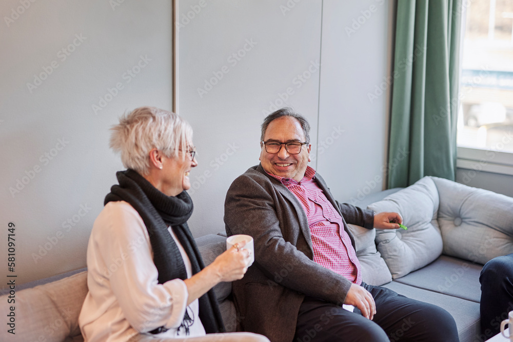 Man and woman talking during coffee break Man and woman talking during coffee break