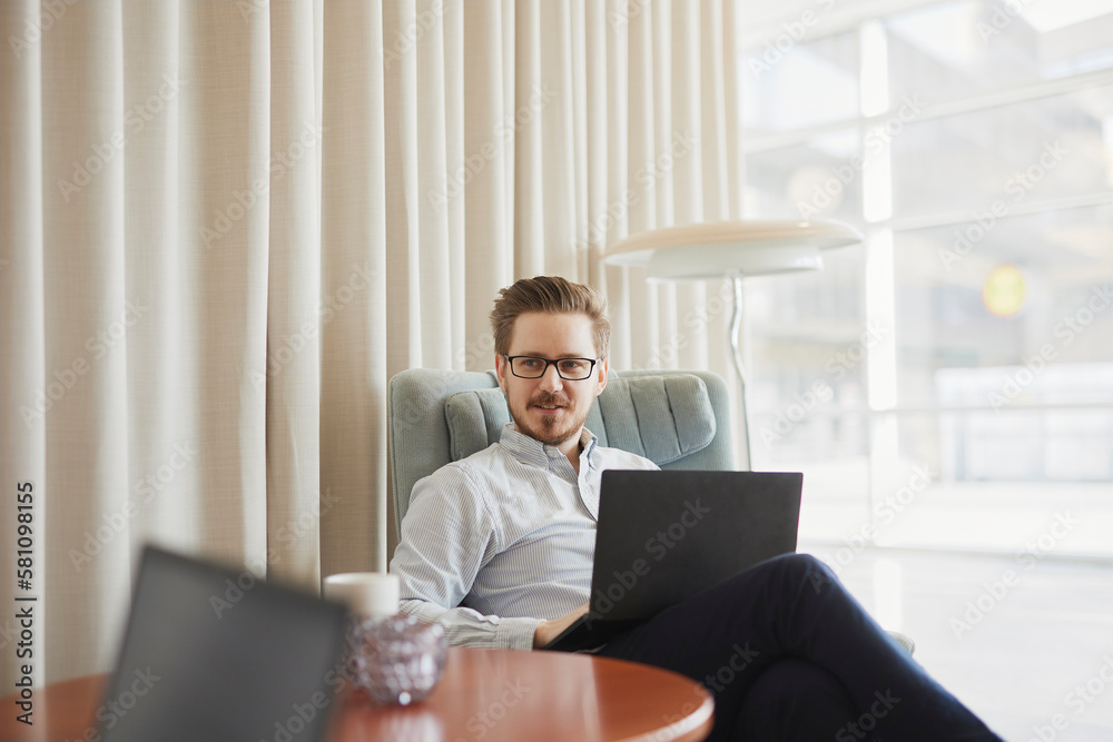 Man using laptop at work Man using laptop at work