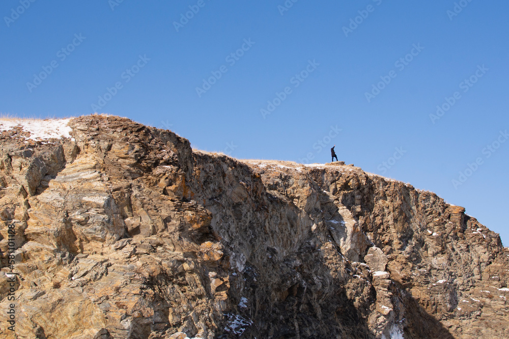 Man on the Mountain, Olkhon Island, Irkutsk region, Russia Man on the Mountain, Olkhon Island, Irkutsk region, Russia