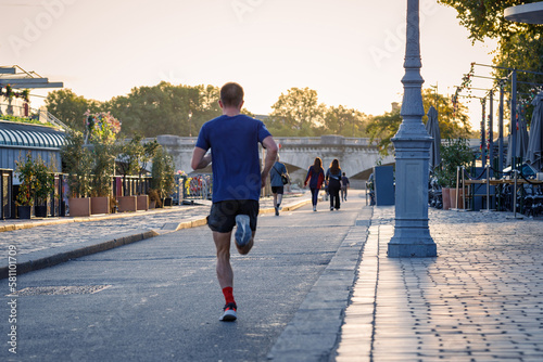 Photography Man run at the Seine river in Paris. France