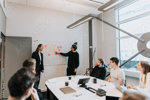 People having presentation during business meeting photo