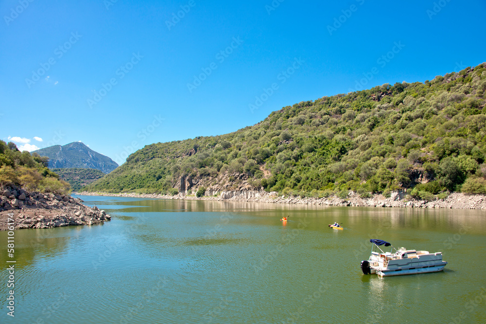 canoeing in Cedrino lake, Dorgali, Sardinia, Italy