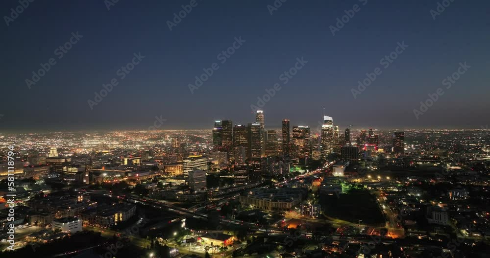 Scenic aerial view of city of downtown Los Angeles skyline at dusk night. Famous skyscrapers. Scenic aerial view of city of downtown Los Angeles skyline at dusk night. Famous skyscrapers.