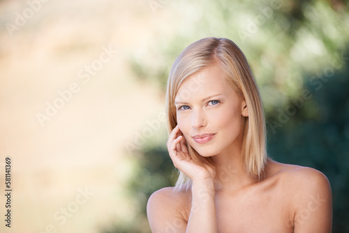 Naturally gorgeous. Portrait of a beautiful young blonde woman sitting after a relaxing spa treatment.