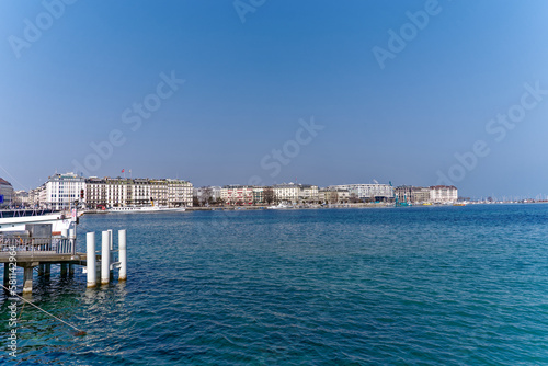 Lake Geneva with skyline at Swiss City of Geneva on a sunny winter day. Photo taken March 5th, 2023, Geneva, Switzerland.