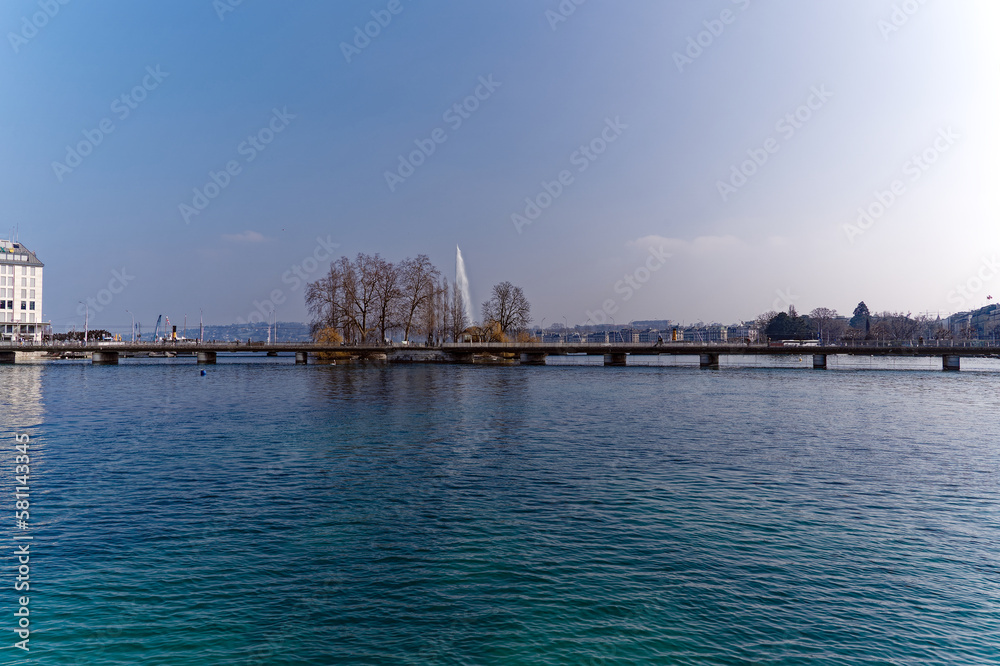 Rhone River with Mont Blanc bridge in the background at Swiss City of Geneva on a sunny winter day. Photo taken March 5th, 2023, Geneva, Switzerland.