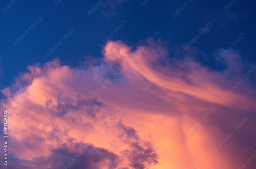 Fototapeta premium abstract background of a storm cloud colored by the sun