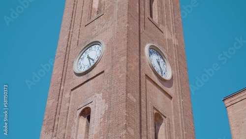 Ancient bell tower with two clocks