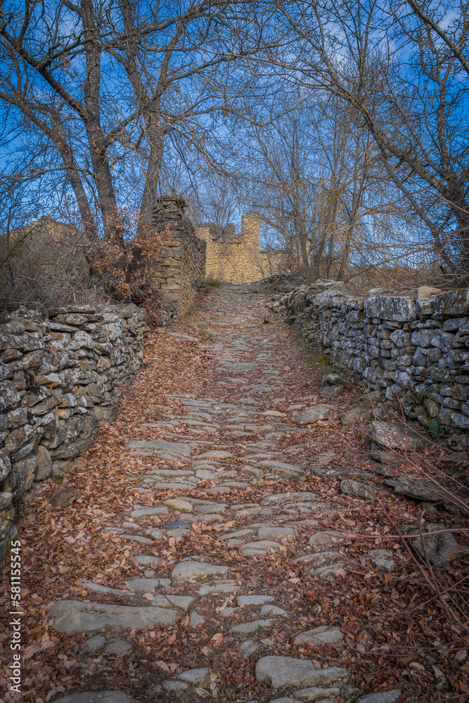 montanana huesca aragon spain path and stone wall climb to the hermitage wing