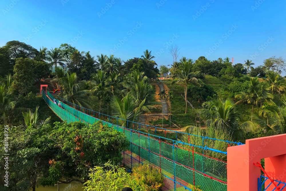 Beautiful Hanging bridge at Khagrachari Hill District Council Horticulture Park, Khagrachari, Chittagong, Bangladesh. Beautiful Hanging bridge at Khagrachari Hill District Council Horticulture Park, Khagrachari, Chittagong, Bangladesh.