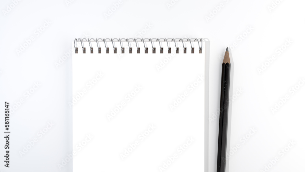 Blank office Notebook or Planner on white desk with black pencil top view with copy space, flat lay Blank office Notebook or Planner on white desk with black pencil top view with copy space, flat lay