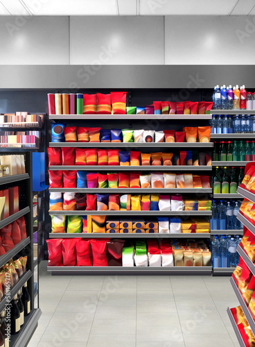 Chips and snacks on shelf at gasoline pump store 

Mockup and illustration is suitable for presenting new packagings, product, promo presentations among many others 