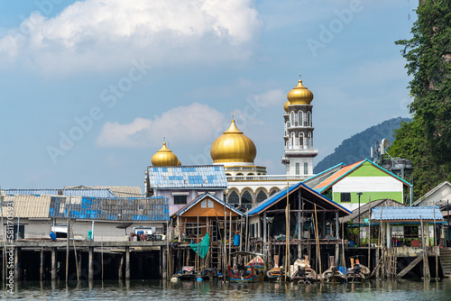 Ko Panyi, Houses on stilts in the sea in thailand and mosque photo