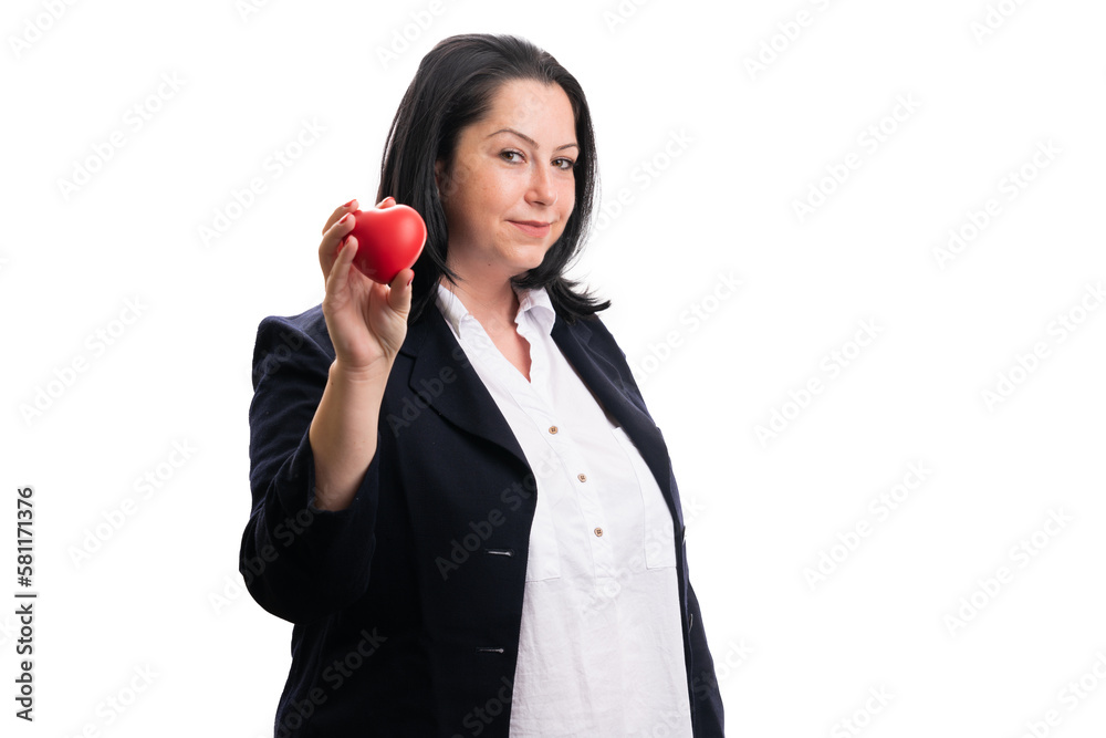 Businesswoman presenting red heart as healthcare concept Businesswoman presenting red heart as healthcare concept