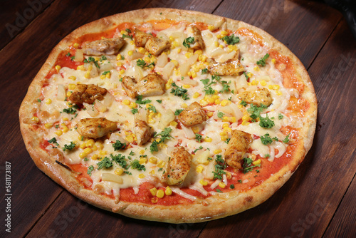 Pizza with corn and chicken