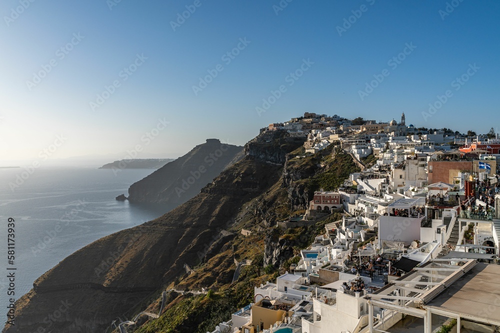 Coastal cityscape of densely populated Fira, the main town of Santorini island in Greece