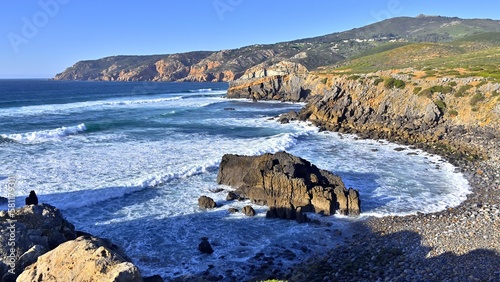 Obraz na płótnie Wild place to relax on Abano beach with impressive cliffs in Sintra Cascais Natu